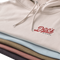 Doc's Staple Hoodie Group shot starting with Tan showing 5 colorways