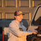 Doc's Diesel Camo Trucker Hat worn by a man in a grey Doc's Diesel Hoodie