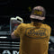 Doc's Diesel Shop Duck Brown T-Shirt on a mechanic